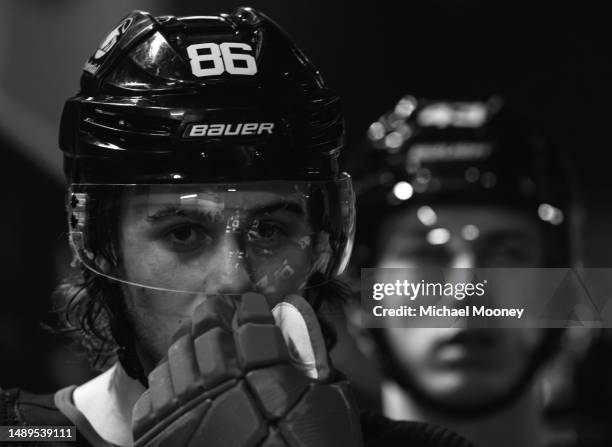 Jack Hughes of the New Jersey Devils walks to the ice before the start of the second period in a game against the Carolina Hurricanes in Game Four of...