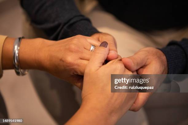 holding hands during couple therapy - betrayal stock pictures, royalty-free photos & images