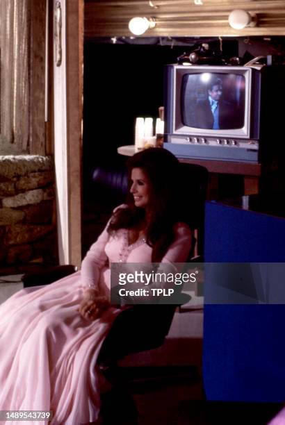 American singer, songwriter and dancer June Carter Cash sits backstage before an episode of The Johnny Cash Show in Tucson, Arizona, April 15, 1970....