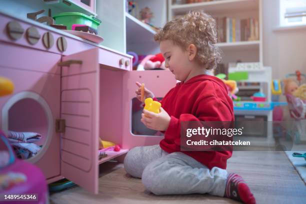 girl playing with toys - cooked turkey white plate stock pictures, royalty-free photos & images