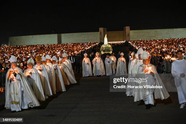 Cardinal Secretary of State of the Vatican Pietro Parolin presides the Rosary and the Candles Procession at the end of the first day ceremonies of...