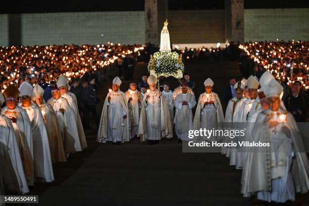 Cardinal Secretary of State of the Vatican Pietro Parolin presides the Rosary and the Candles Procession at the end of the first day ceremonies of...