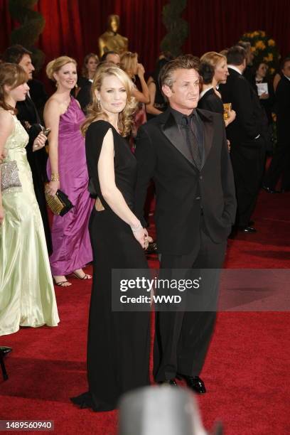 Robin Wright Penn and Sean Penn attend the 81st annual Academy Awards at the Kodak Theatre. Wright Penn wears Monique Lhuiller and Penn wears Giorgio...