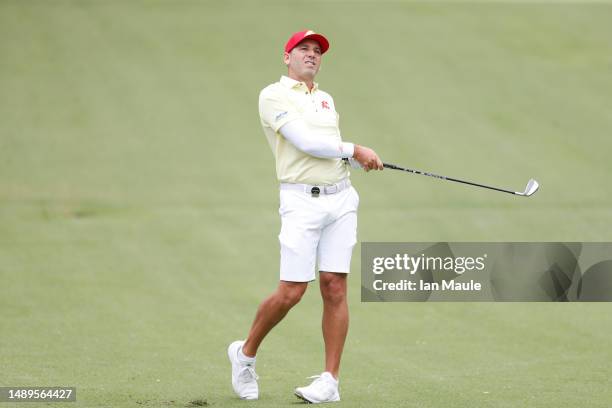 Sergio Garcia of Fireballs GC reacts to his approach shot on the first hole during Day One of the LIV Golf Invitational - Tulsa at Cedar Ridge...