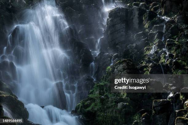 waterfalls flowing over columnar jointing - isogawyi stock pictures, royalty-free photos & images
