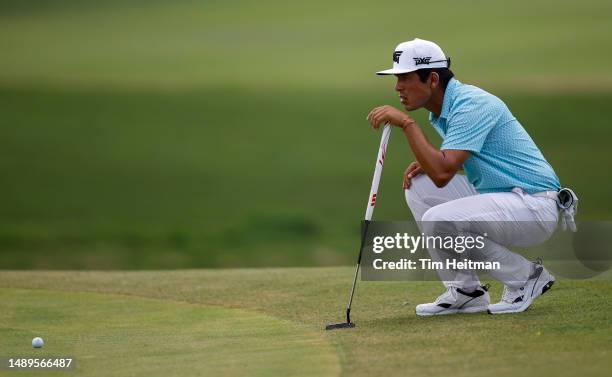 Augusto Núñez of Argentina lines up his putt on the 12th hole during the second round of the AT&T Byron Nelson at TPC Craig Ranch on May 12, 2023 in...