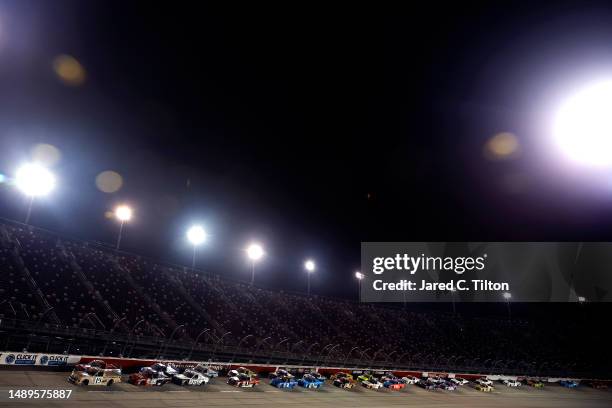 Christian Eckes, driver of the Gates Hydraulics Chevrolet, leads the field during the NASCAR Craftsman Truck Series Buckle Up South Carolina 200 at...