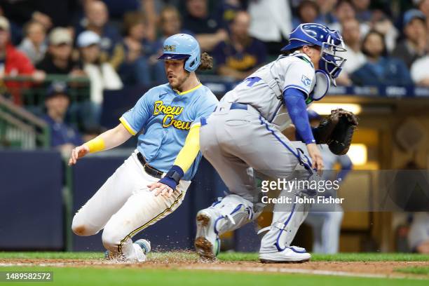 Brian Anderson of the Milwaukee Brewers scores on a base hit by Tyrone Taylor in the fourth inning against the Kansas City Royals at American Family...
