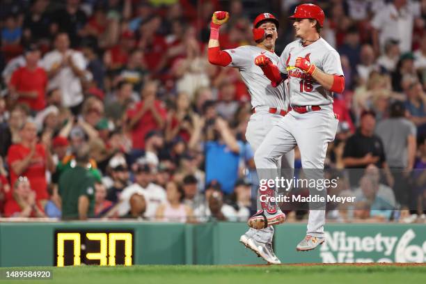 Nolan Gorman of the St. Louis Cardinals celebrates with Lars Nootbaar after hitting a two run home run against the Boston Red Sox during the ninth...