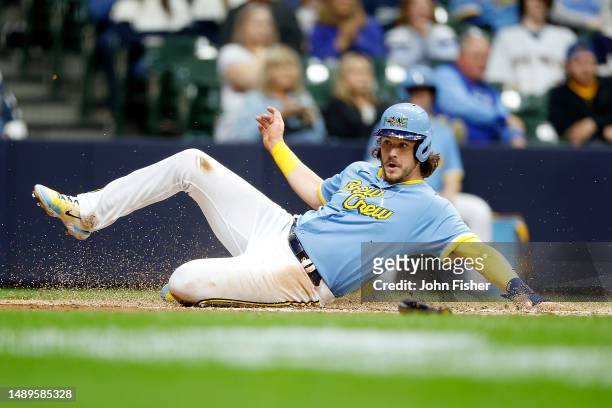 Brian Anderson of the Milwaukee Brewers scores on a base hit by Tyrone Taylor in the fourth inning against the Kansas City Royals at American Family...