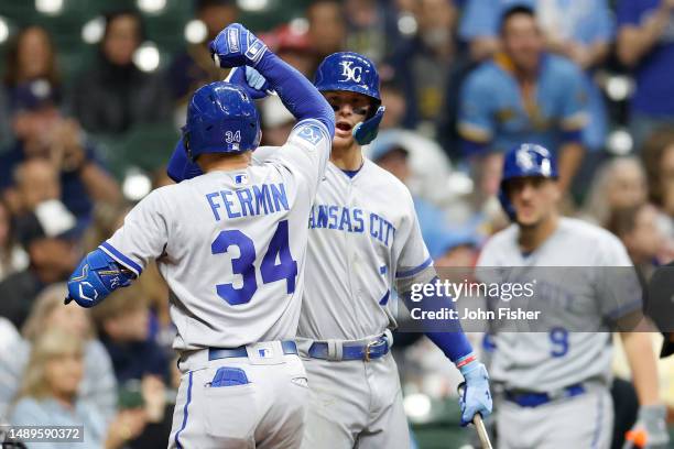 Freddy Fermin of the Kansas City Royals is congratulated by Bobby Witt Jr. #7 after hitting a solo home run in the seventh inning against the...
