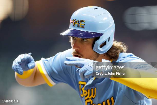 Brian Anderson of the Milwaukee Brewers reacts after hitting a single in the fourth inning against the Kansas City Royals at American Family Field on...