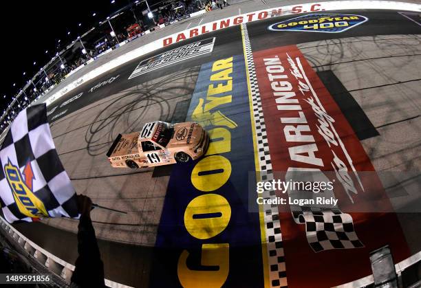 Christian Eckes, driver of the Gates Hydraulics Chevrolet, takes the checkered flag to win the NASCAR Craftsman Truck Series Buckle Up South Carolina...