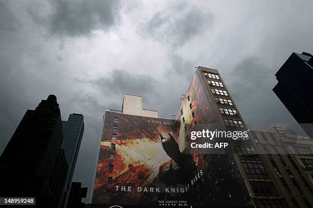 Heightened police presence at a movie theater in Times Square in New York on July 20, 2012 before a showing of "The Dark Knight Rises". Commissioner...