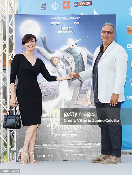 Rosalba Pippa aka Arisa and Enzo De Caro attend 2012 Giffoni Film Festival photocall on July 20, 2012 in Giffoni Valle Piana, Italy.