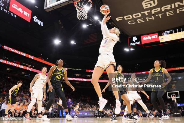 Sophie Cunningham of the Phoenix Mercury puts up a shot over Nneka Ogwumike of the Los Angeles Sparks during the first half of the WNBA game at...