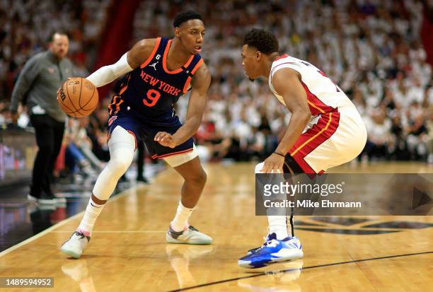 Barrett of the New York Knicks drives on Kyle Lowry of the Miami Heat during game six of the Eastern Conference Semifinals in the 2023 NBA Playoffs...