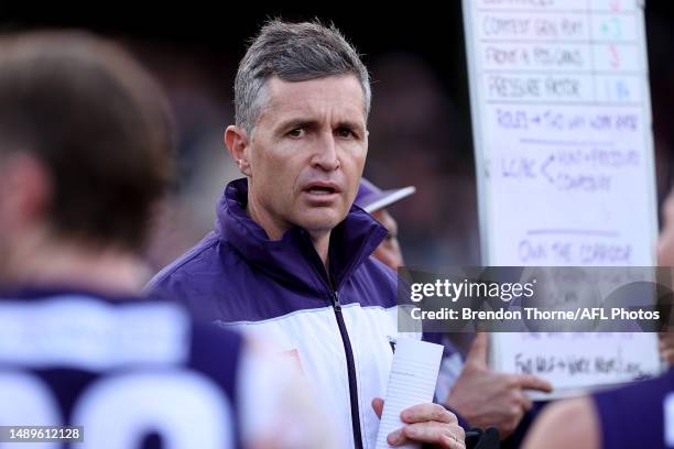 Dockers coach, Justin Longmuir speaks to his players during the round nine AFL match between Sydney Swans and Fremantle Dockers at Sydney Cricket...