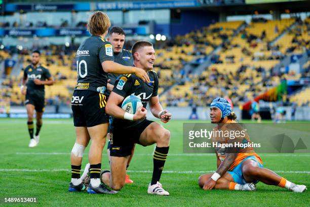 Jordie Barrett of the Hurricanes celebrates after scoring a try during the round 12 Super Rugby Pacific match between Hurricanes and Moana Pasifika...