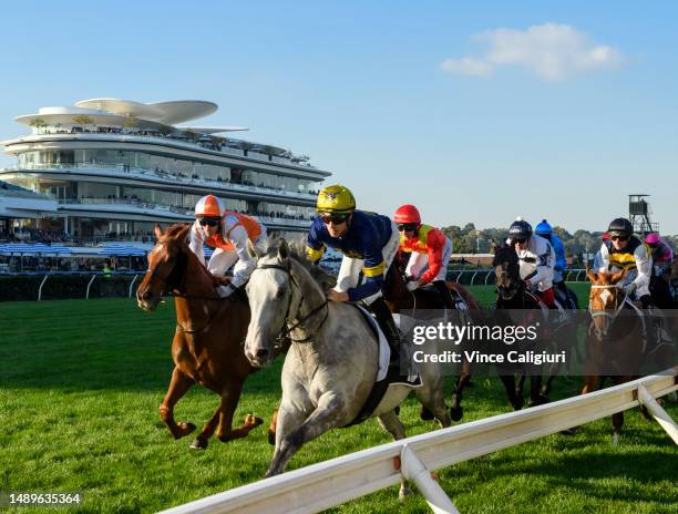 Jordan Childs riding White Marlin and Jamie Mott riding Vow and Declare lead the field in Race 7, the Lexus Andrew Ramsden, during Melbourne Racing...