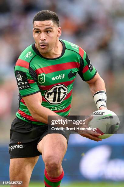 Cody Walker of the Rabbitohs runs the ball during the round 11 NRL match between South Sydney Rabbitohs and Wests Tigers at Accor Stadium on May 13,...