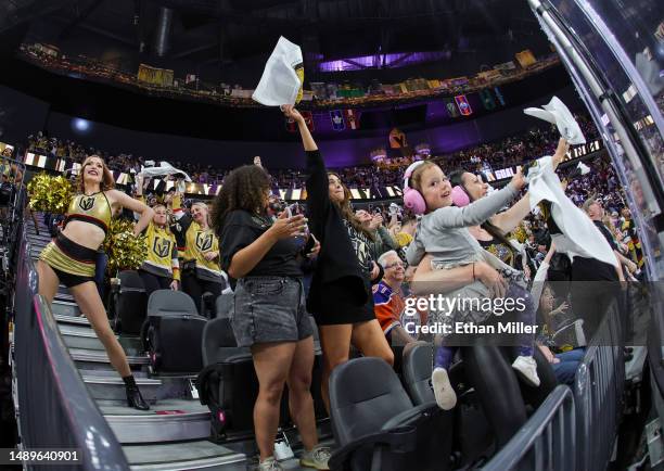 Member of the Vegas Golden Knights Vegas Vivas cheerleaders and fans react after Jack Eichel of the Vegas Golden Knights scored a first-period goal...