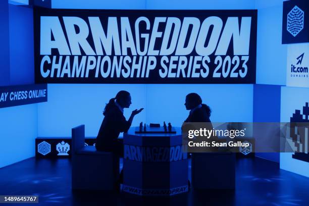 Chess grandmasters Alexandra Kosteniuk and Koneru Humpy prepare to face off during the women's week of the Armageddon Championship Series in a live...