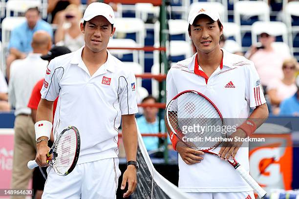 Kei Nishikori of Japan and Go Soeda of Japan pose at the net before their match during the BB&T Atlanta Open at Atlantic Station on July 20, 2012 in...