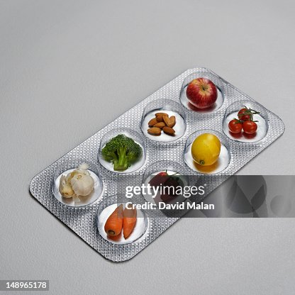 Pill blister pack containing fruit and vegtables Pill blister pack containing fruit and vegtables