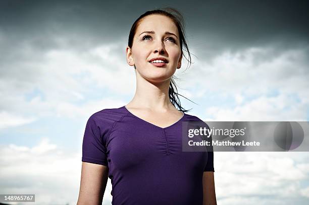 female runner - looking up stock pictures, royalty-free photos & images