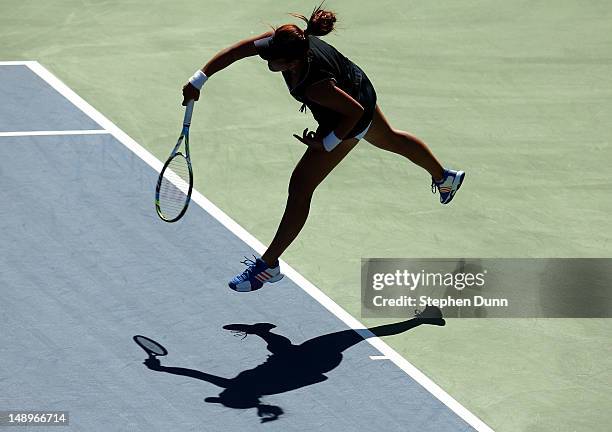 Yung-Jan Chan of Taipei serves to Jelena Jankovic of Serbia during day seven of the Mercury Insurance Open Presented By Tri-City Medical at La Costa...