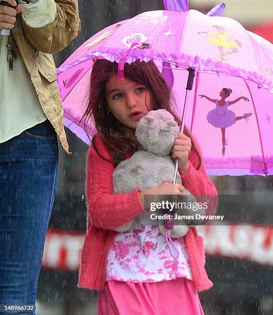 Suri Cruise seen walking in the rain in the Meat Packing District on July 20, 2012 in New York City.