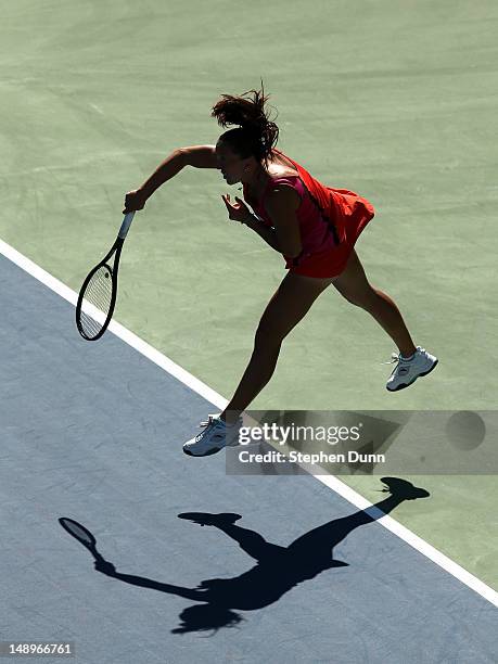 Jelena Jankovic of Serbia serves to Yung-Jan Chan of Taipei during day seven of the Mercury Insurance Open Presented By Tri-City Medical at La Costa...