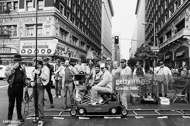 Ratman and Bobbin" Episode 411 -- Pictured: Crew on set of "Hill Street Blues", Director of Photography John C. Flinn III is on camera dolly --