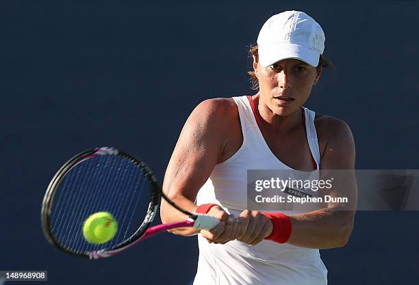 Vavara Lepchenko hits a return to Nadia Petrova of Russia during day seven of the Mercury Insurance Open Presented By Tri-City Medical at La Costa...