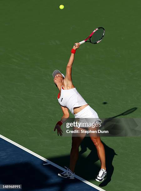 Vavara Lepchenko serves to Nadia Petrova of Russia during day seven of the Mercury Insurance Open Presented By Tri-City Medical at La Costa Resort &...