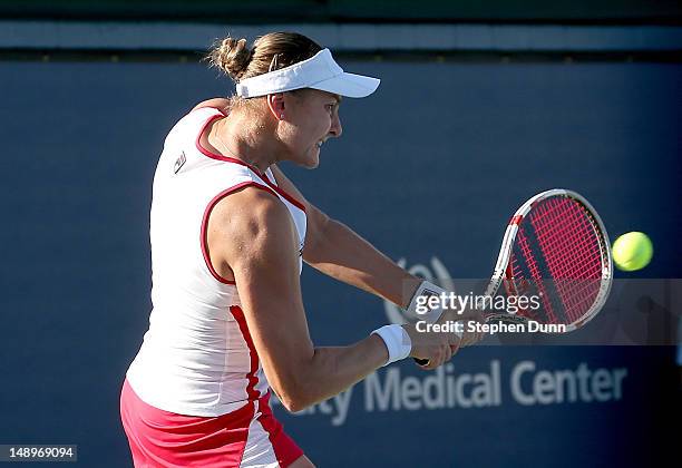 Nadia Petrova of Russia hits a shot to Vavara Lepchenko during day seven of the Mercury Insurance Open Presented By Tri-City Medical at La Costa...