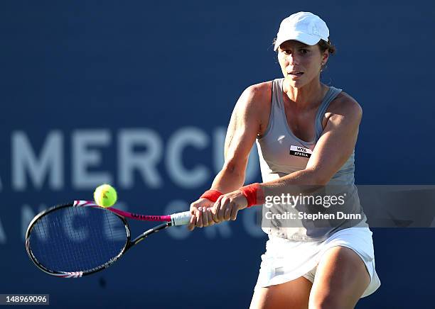 Vavara Lepchenko hits a return to Nadia Petrova of Russia during day seven of the Mercury Insurance Open Presented By Tri-City Medical at La Costa...