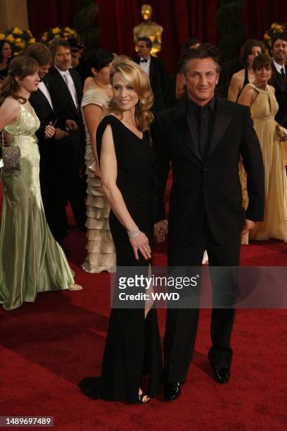 Robin Wright Penn and Sean Penn attend the 81st annual Academy Awards at the Kodak Theatre. Wright Penn wears Monique Lhuiller and Penn wears Giorgio...