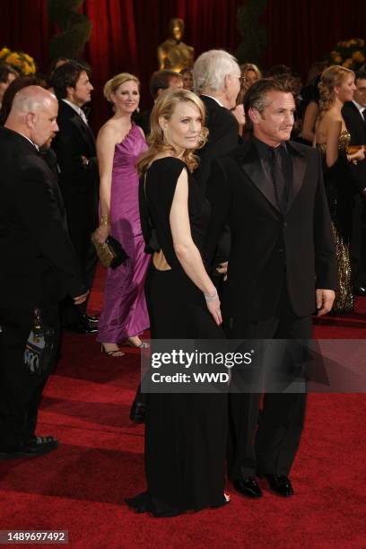 Robin Wright Penn and Sean Penn attend the 81st annual Academy Awards at the Kodak Theatre. Wright Penn wears Monique Lhuiller and Penn wears Giorgio...