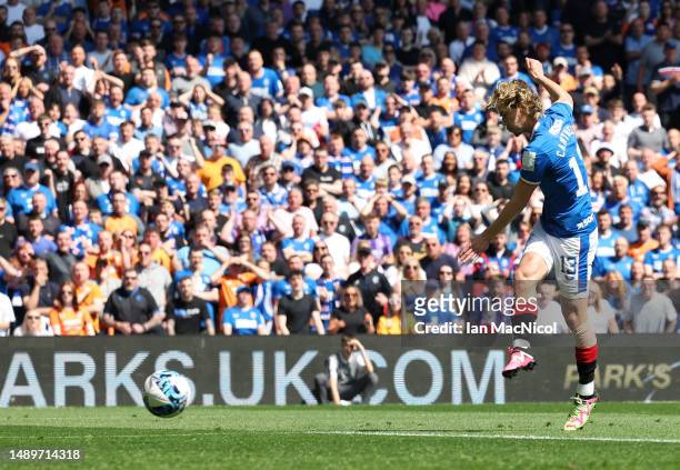 Todd Cantwell of Rangers FC scores the team's first goal during the Cinch Premiership match between Rangers and Celtic at Ibrox Stadium on May 13,...