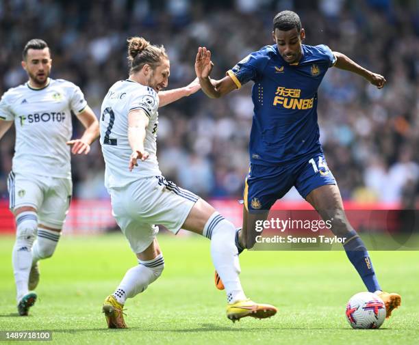 Luke Ayling of Leeds United tackles Alexander Isak of Newcastle United during the Premier League match between Leeds United and Newcastle United at...