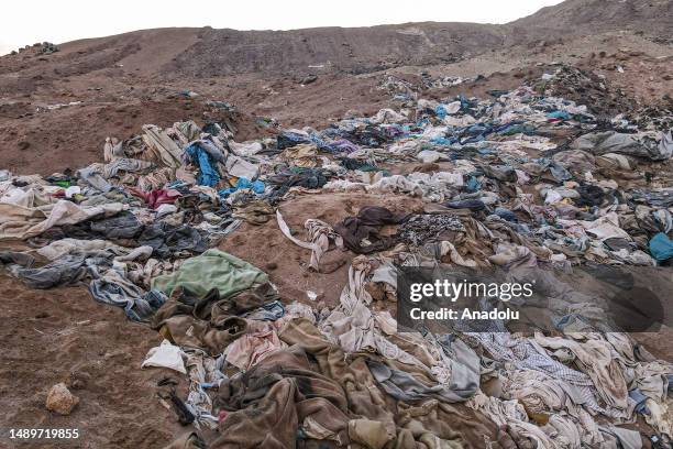 View of waste fabric pieces or clothes in Atacama Desert of Alto Hospicio, Chile on June 15, 2023. Atacama, the world's driest and hottest desert in...