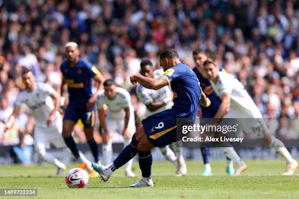 Callum Wilson of Newcastle United scores the team's first goal from the penalty spot during the Premier League match between Leeds United and...