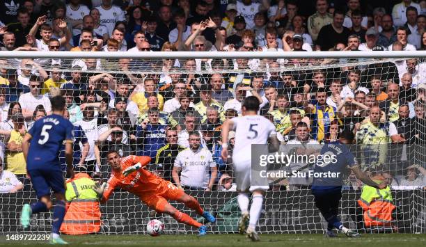 Callum Wilson of Newcastle United scores the team's first goal from the penalty spot during the Premier League match between Leeds United and...