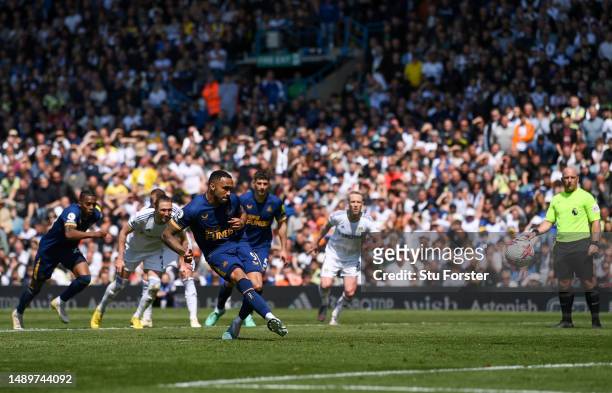 Callum Wilson of Newcastle United scores the team's second goal from the penalty spot during the Premier League match between Leeds United and...