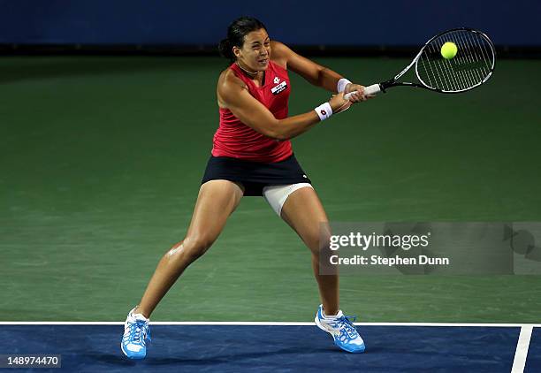 Marion Bartoli of France returns a shot to Christina McHale during day seven of the Mercury Insurance Open Presented By Tri-City Medical at La Costa...