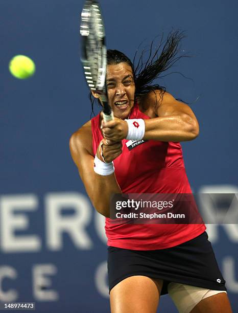 Marion Bartoli of France returns a shot to Christina McHale during day seven of the Mercury Insurance Open Presented By Tri-City Medical at La Costa...