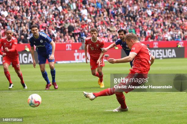 Joshua Kimmich of FC Bayern Munich scores the team's second goal during the Bundesliga match between FC Bayern München and FC Schalke 04 at Allianz...