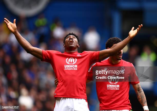 Taiwo Awoniyi of Nottingham Forest celebrates after scoring the team's first goal during the Premier League match between Chelsea FC and Nottingham...